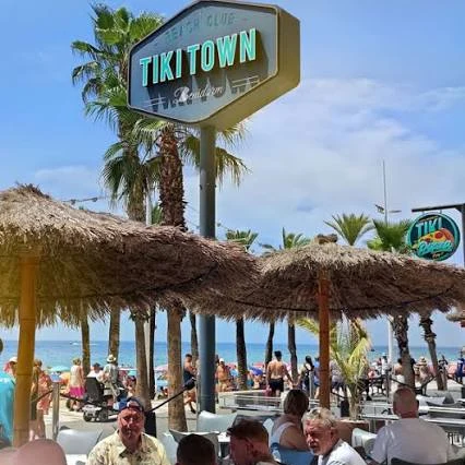 Tiki Beach terrace under the thatched parasols on the Levante seafront