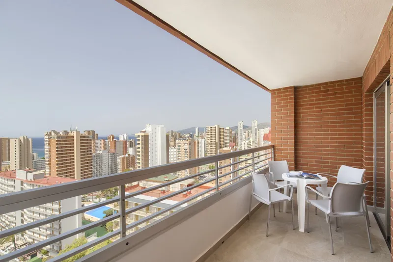 Levante Lux: Balcony view, Balcony with table and chairs over the Benidorm skyline