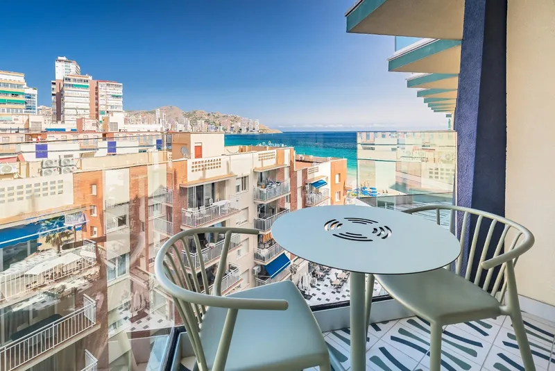Barceló Beach: Balcony view, Balcony table and chairs looking along the seafront