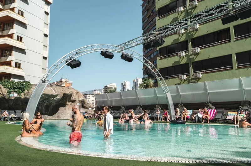 BC Music Resort: Pool, Lagoon-style pool on a lawn under a lighting arch