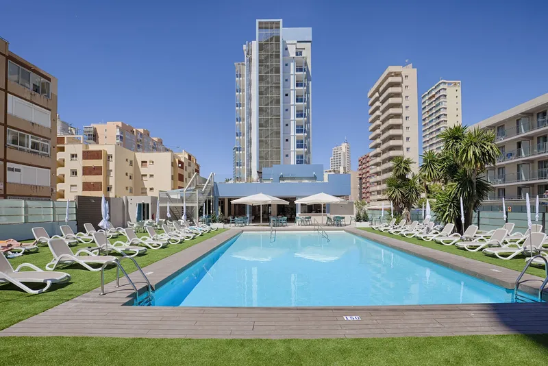 Benidorm Centre: Pool, Pool and lawn with loungers below the hotel tower