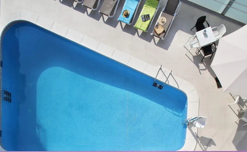 Hotel Brasil: The pool, Pool from above with loungers