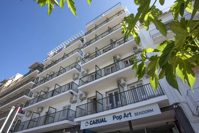 Casual Pop Art: The hotel, Hotel facade with balconies and Casual Pop Art sign