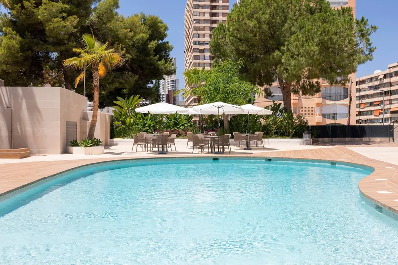 Halley Hotel: Pool garden, Pool among pines and parasols