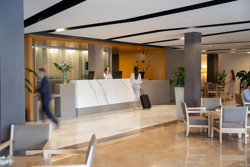 Helios: Reception, Reception desk and lobby seating