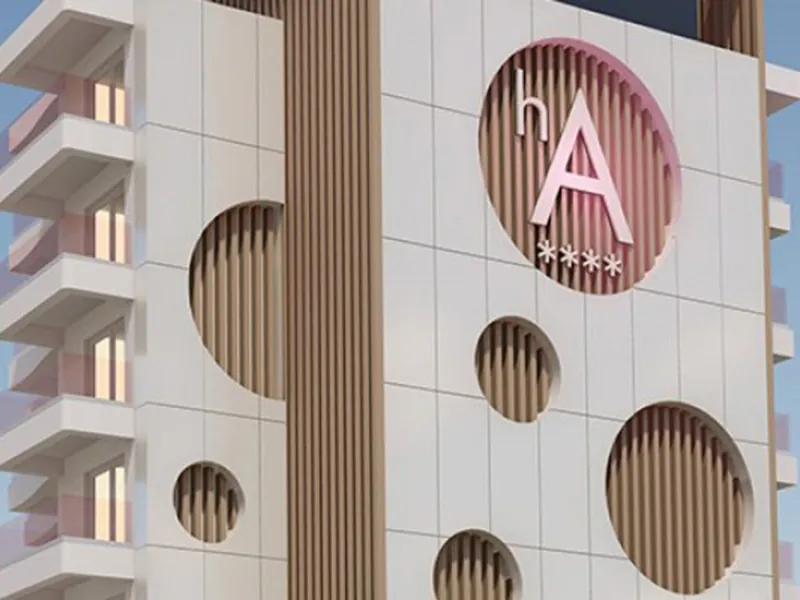 Ambassador Playa II: The facade, Round cut-outs and the A logo on the block