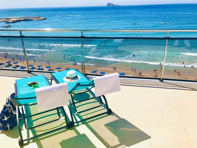Marconi: Beach view, Two loungers with towels above the beach and sea