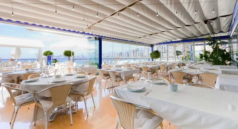 Hotel Nadal: Terrace dining, Covered terrace tables facing the sea