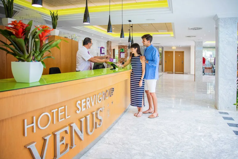 Venus: Reception, Reception desk with Hotel Servigroup Venus lettering