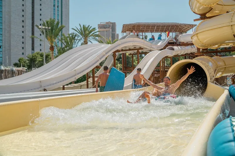 Magic Tropical Splash: Water slides, Riders coming down the slides