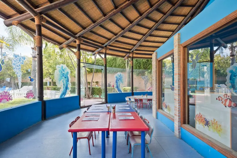 Meliá Benidorm: Kids club, Covered kids club with small tables and sea murals