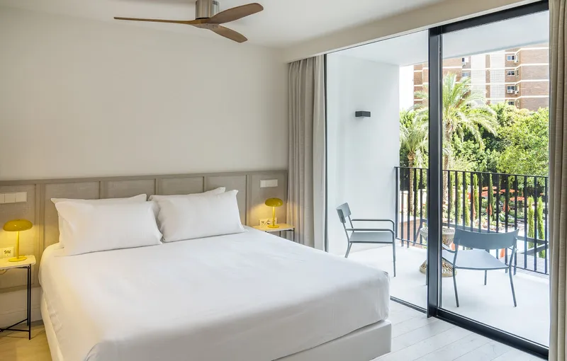Mercure: Double room, Double bed with balcony doors onto greenery