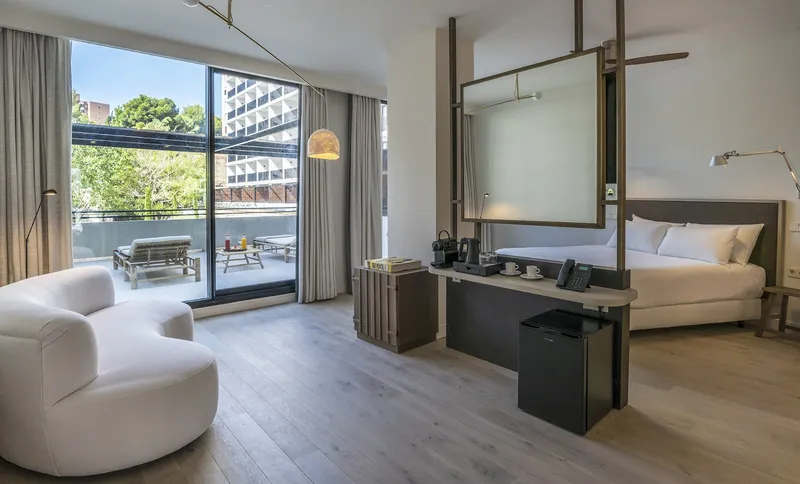 Mercure: Room with terrace, Room with sofa, desk and doors to a terrace