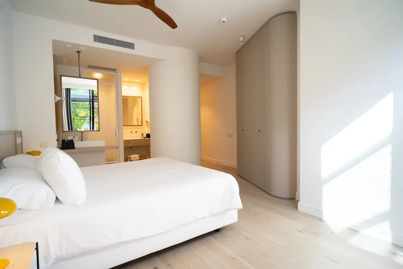 Mercure: Double room, Double bed with curved wardrobe and open bathroom