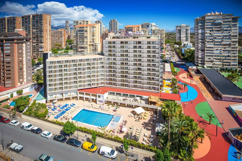 Orange: The hotel, Hotel and pool terrace with loungers seen from above