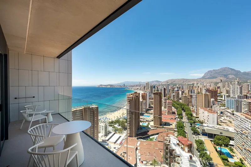 Port Benidorm: Balcony view, Balcony chairs above Levante beach and the skyline