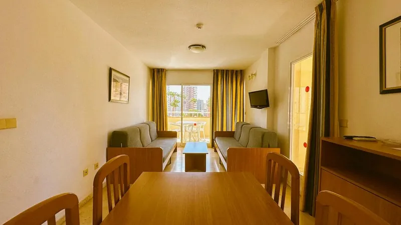 Poseidon Resort: Apartment, Apartment lounge and dining area