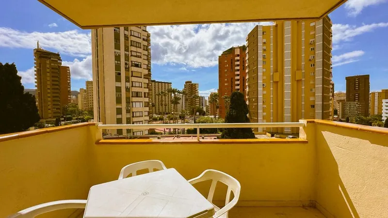 Poseidon Resort: Apartment balcony, Balcony table among the towers