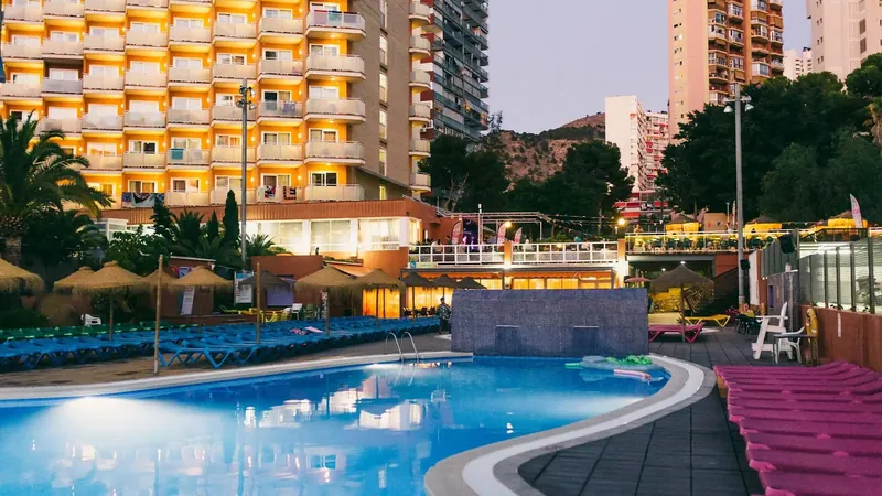 Hotel Regente: Pool at dusk, Pool and terrace lit at dusk