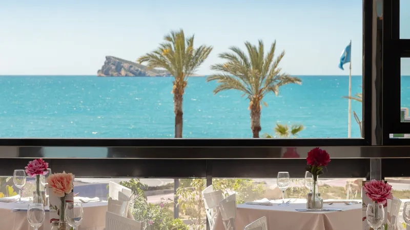 Corona del Mar: Sea view, Laid tables by a window looking to Benidorm Island