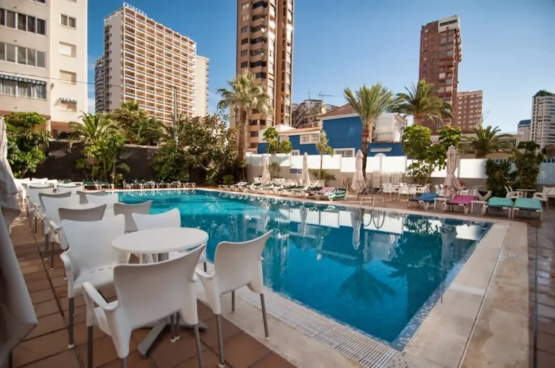 RH Royal: Pool, Pool with tables, loungers and palms