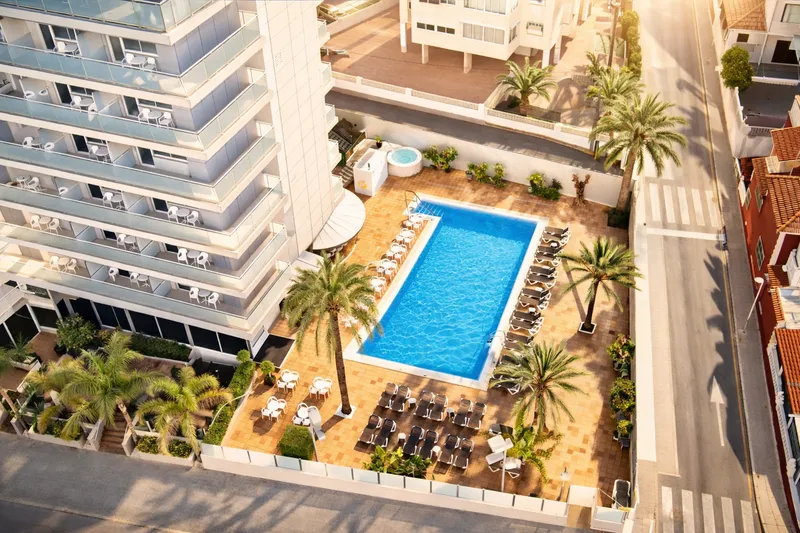 RH Royal: Pool from above, Pool and palm garden seen from above beside the hotel