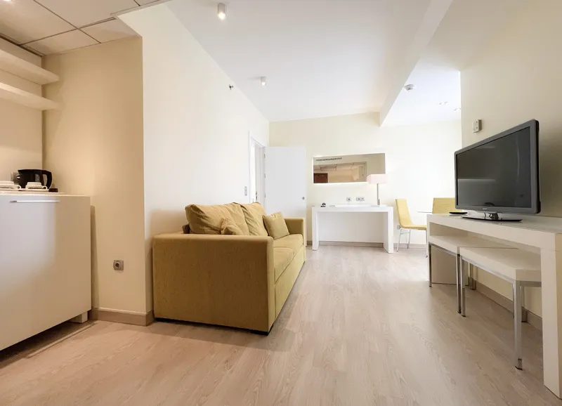 Riviera: Room with sofa, Room with sofa, desk and wall TV