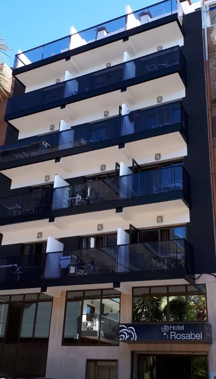 Rosabel: The hotel, Hotel front with dark balconies and the Rosabel sign