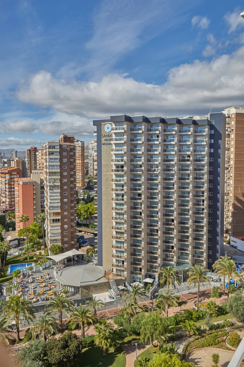 Sandos Monaco: The hotel, Hotel tower among high-rises with the sea behind