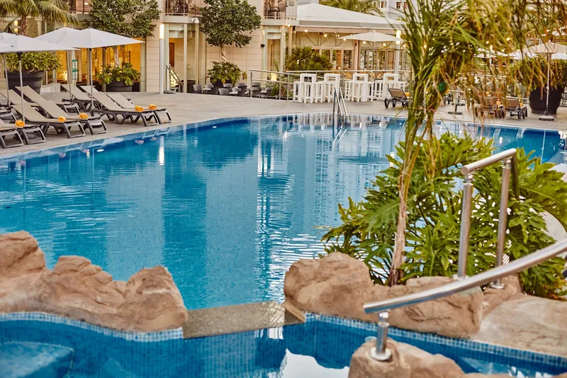 Sandos Monaco: Pool, Pool with rock edging, loungers and palms