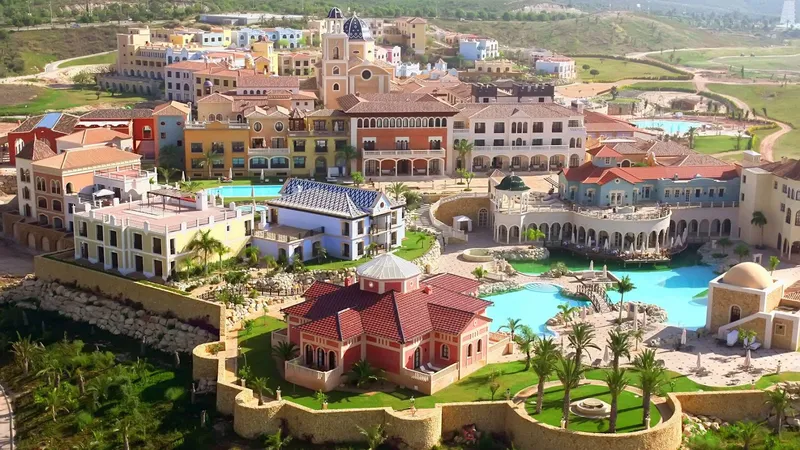 The Level: The resort, Aerial view of the resort buildings, pools and gardens