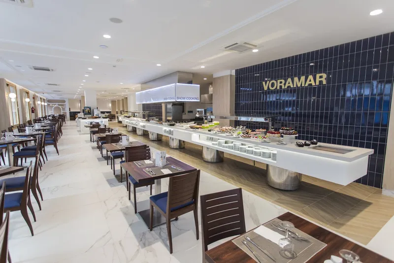 Voramar: Buffet, Buffet counter and dining tables under a Voramar sign