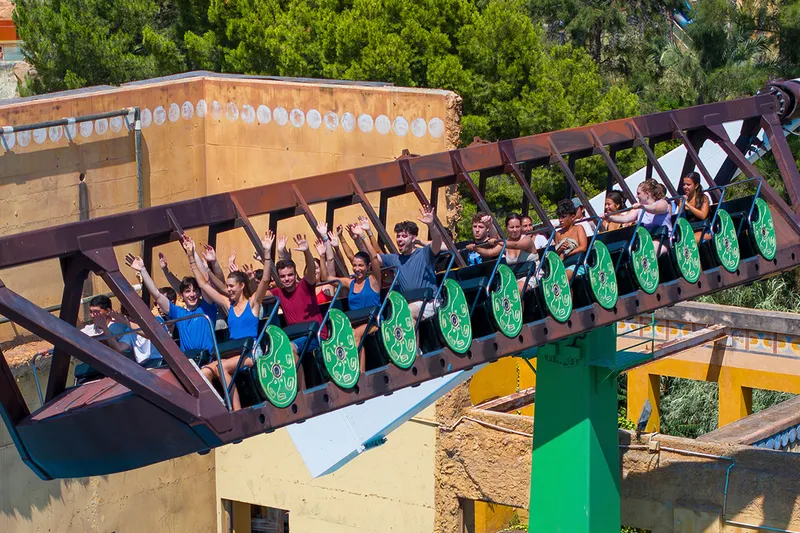 Arms up on La Cólera de Akiles: The swinging boat in The Islands area, one of the rides teenagers queue for