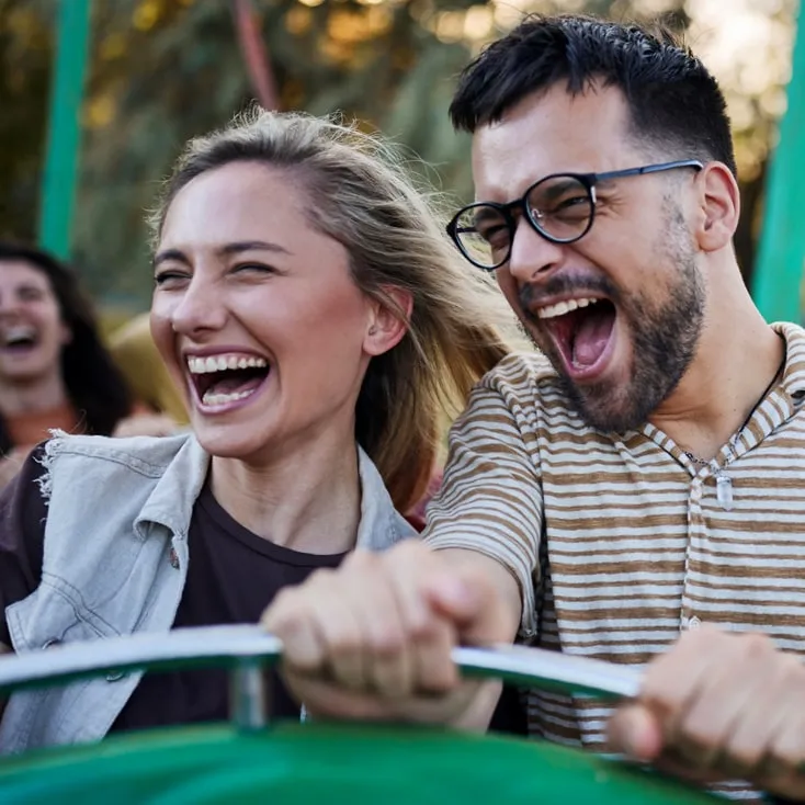 Front row, mid-scream: The park's own picture of what a coaster day feels like