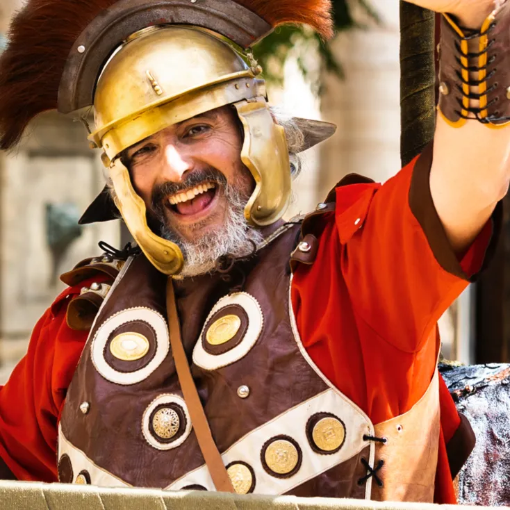 A centurion on parade: Street actors in Rome and Greece keep the walkways busy between rides