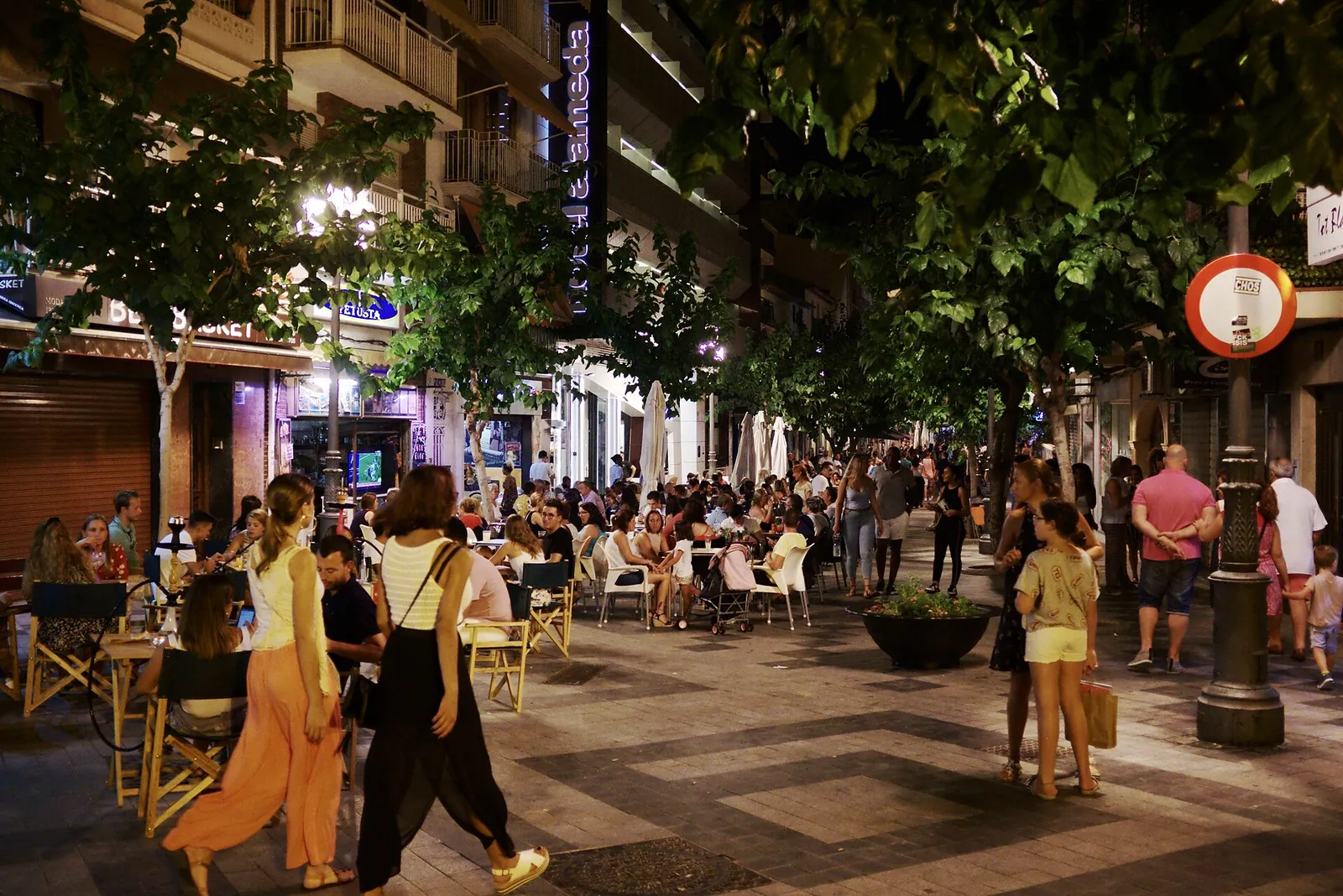 Crowded bar terraces on a warm Saturday night in Benidorm